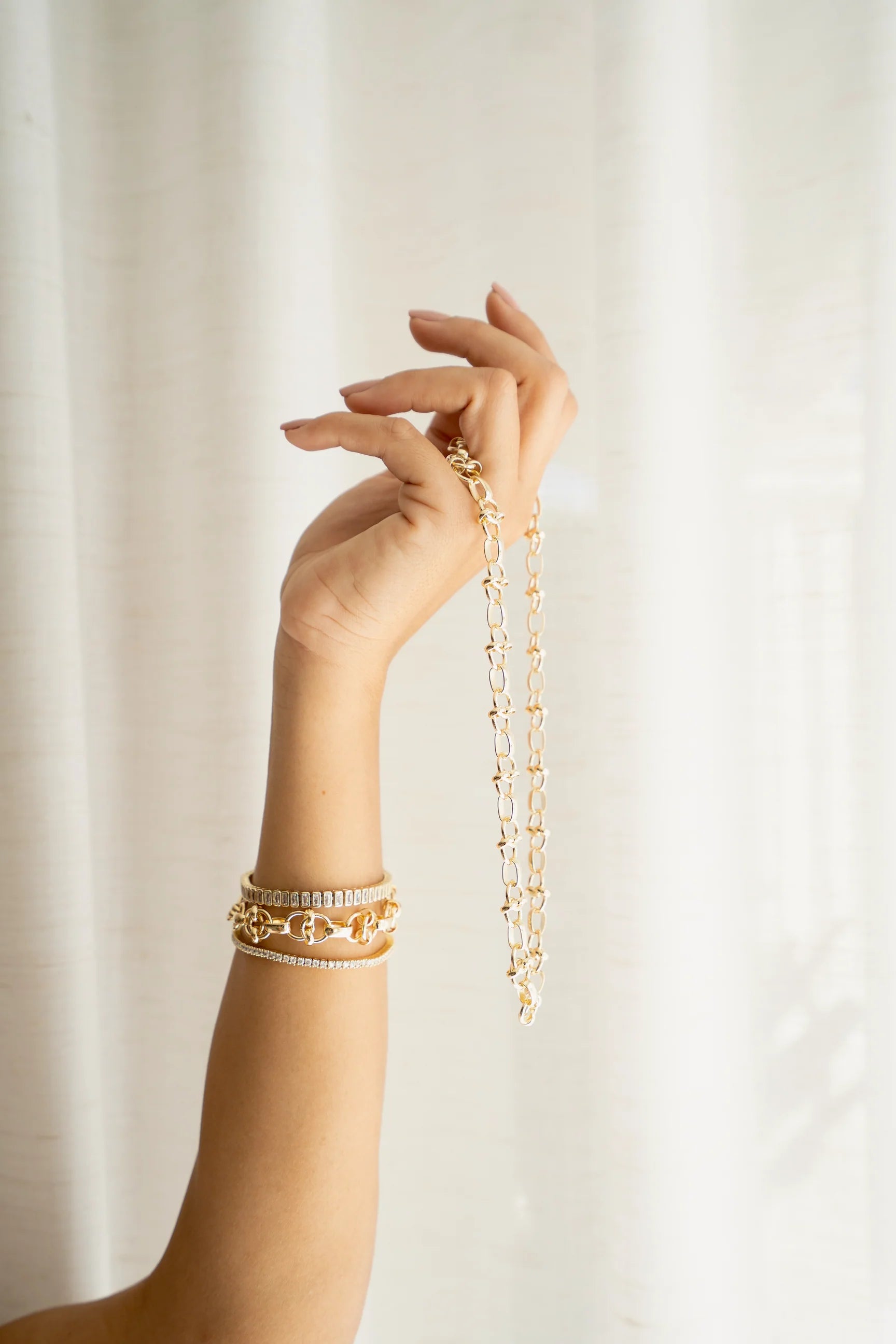 Intertwined Swirl Link Rolo Bracelet